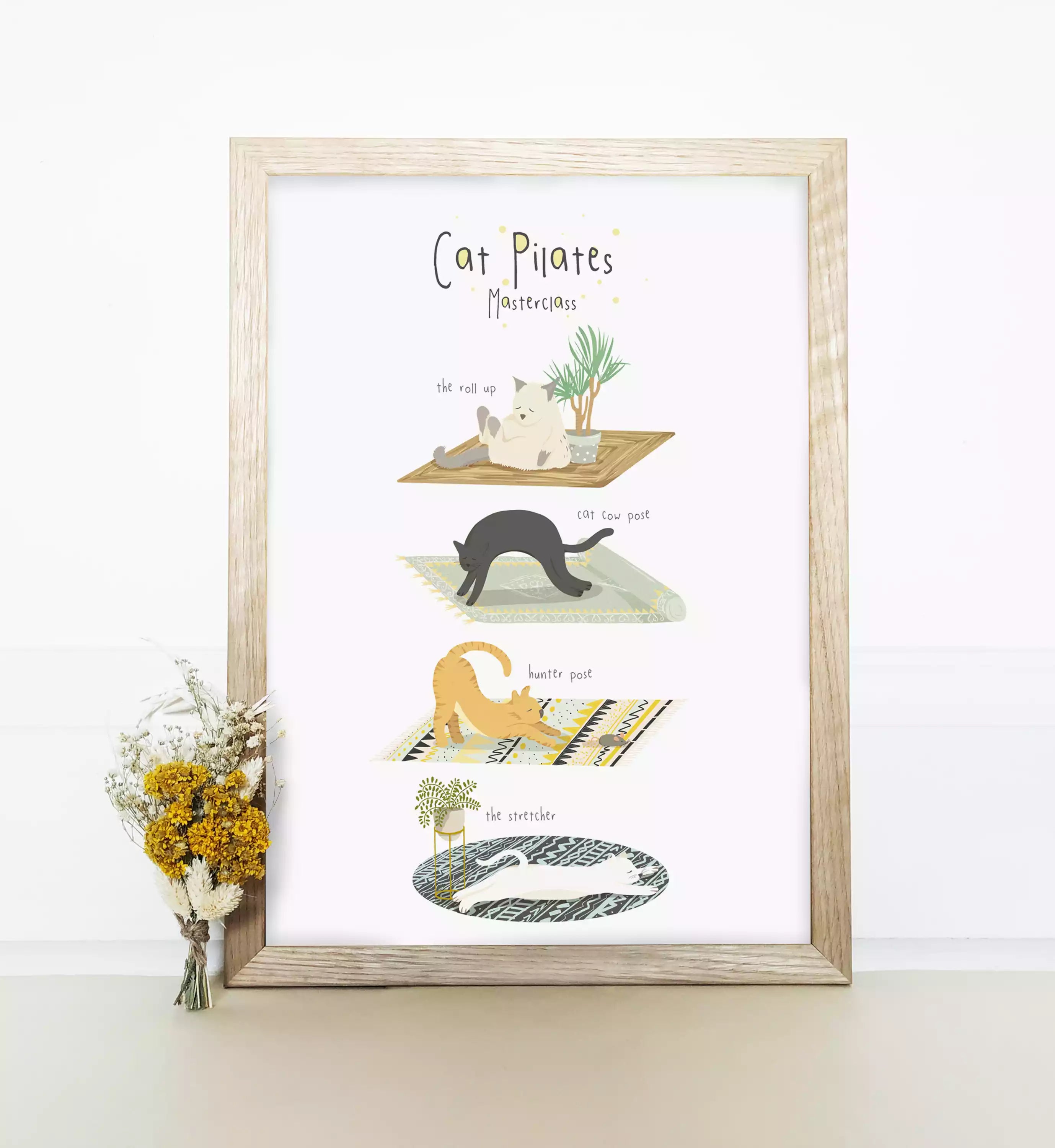 Illustrated print with text 'Cat Pilates Masterclass' and funny cats in different poses, like 'cat cow'.