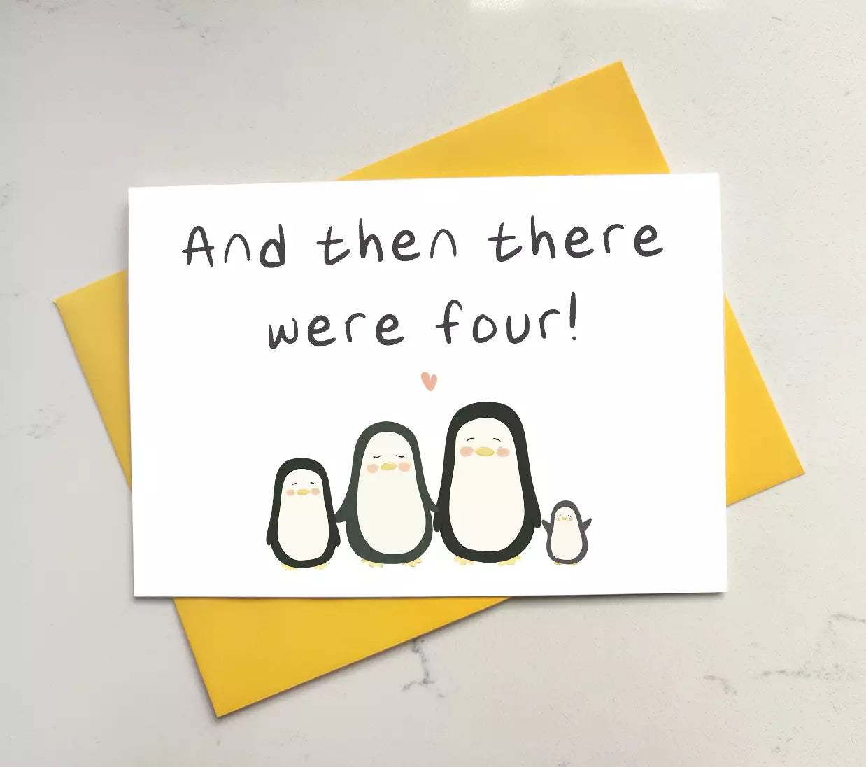 New baby card featuring four penguins and text 'then there were four'