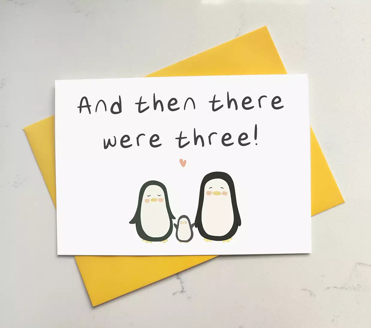 New baby card featuring three penguins and text 'then there were three'