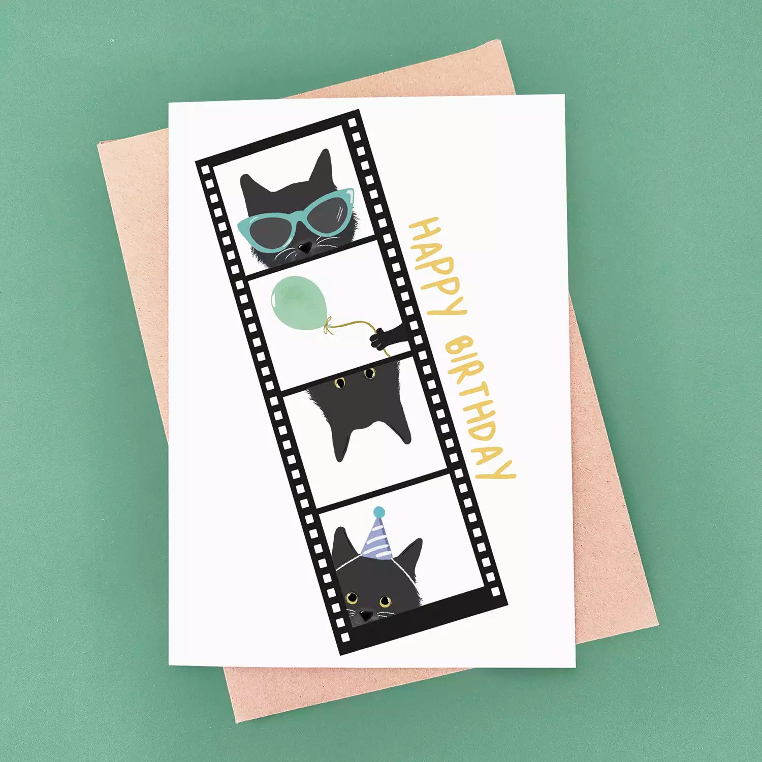 Birthday card with black cat illustrations  in a photo booth strip, and 'Happy Birthday' text 