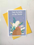 birthday card with two capybaras and pun 'capy birthday to you!'