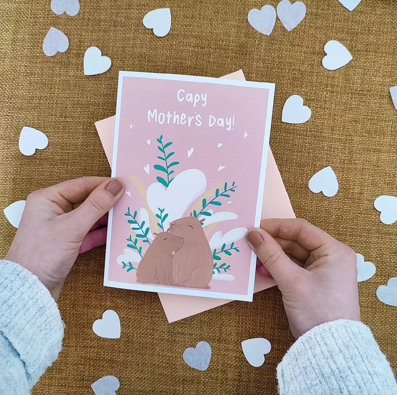 mothers day card with two capybaras and pun 'Capy Mother's Day'