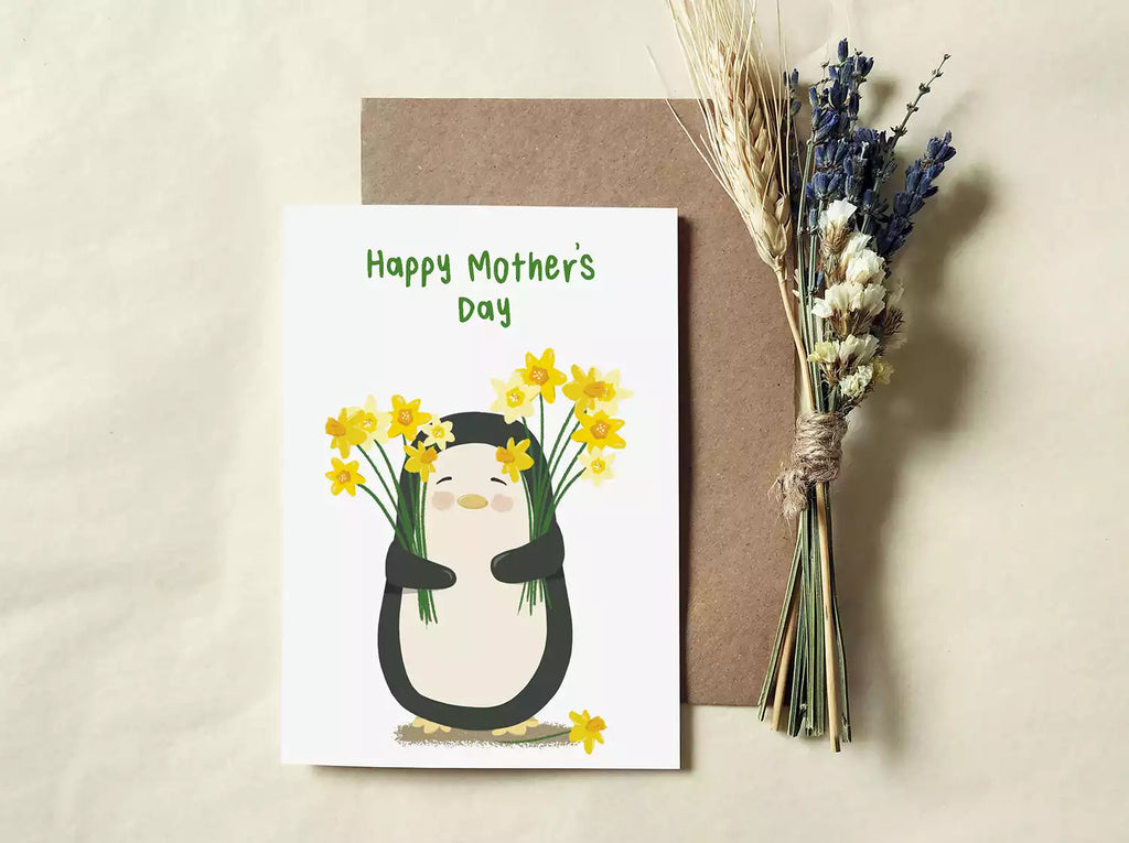 penguin holding daffodils and text 'happy mother's day'