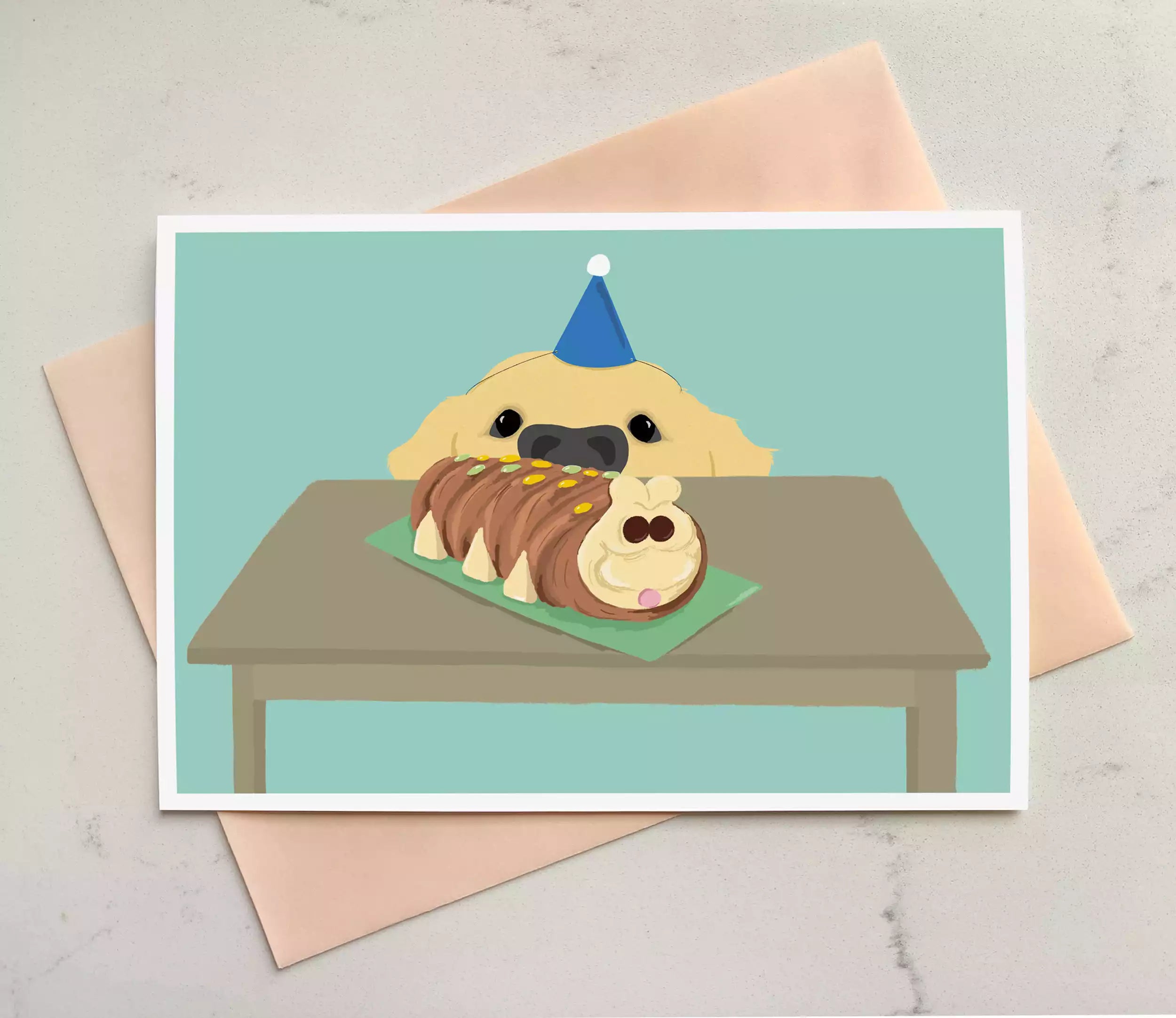 birthday card featuring dog looking up at a cateprillar cake