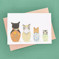 funny Russian nesting dolls as a stack of colourful cats, each with its own personality!