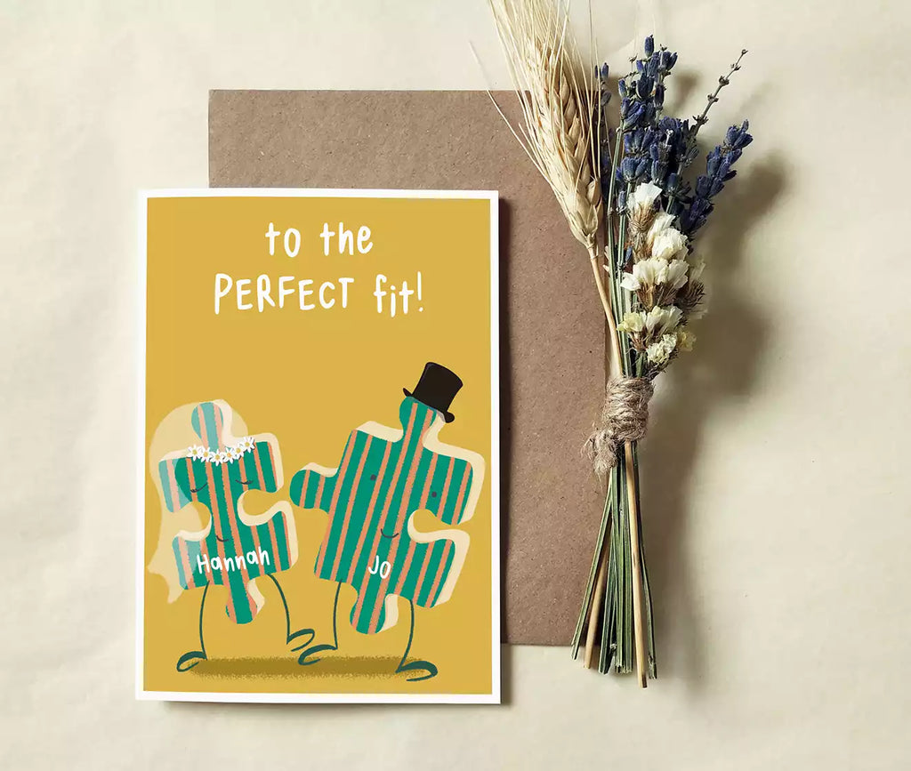 jigsaw pieces wedding card with text 'to the perfect fit' personalised with couple's names