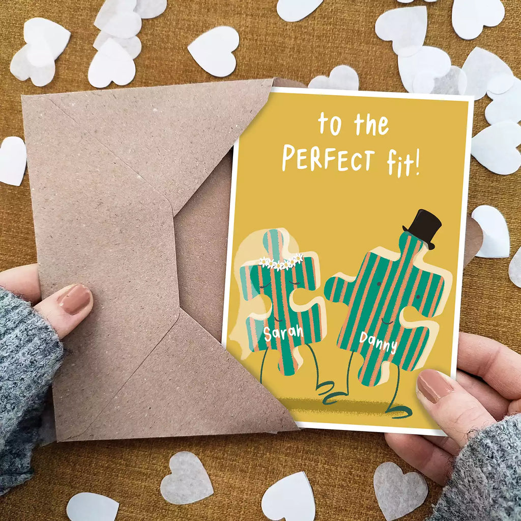 jigsaw pieces wedding card with text 'to the perfect fit' personalised with couple's names
