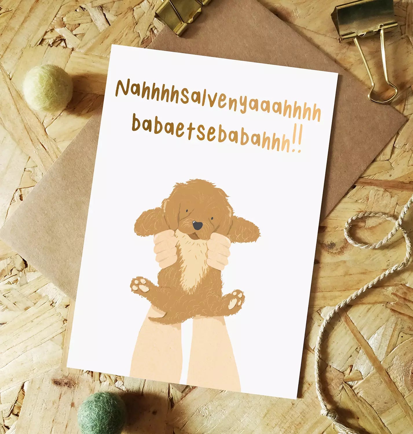 new baby card featuring a puppy being held up similar to the Lion King