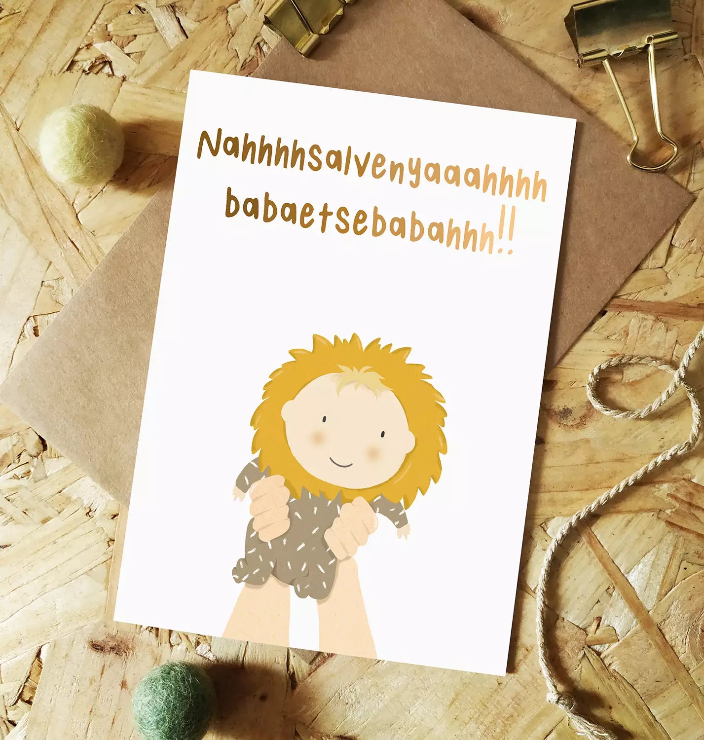 new baby card featuring a baby being held up similar to the Lion King