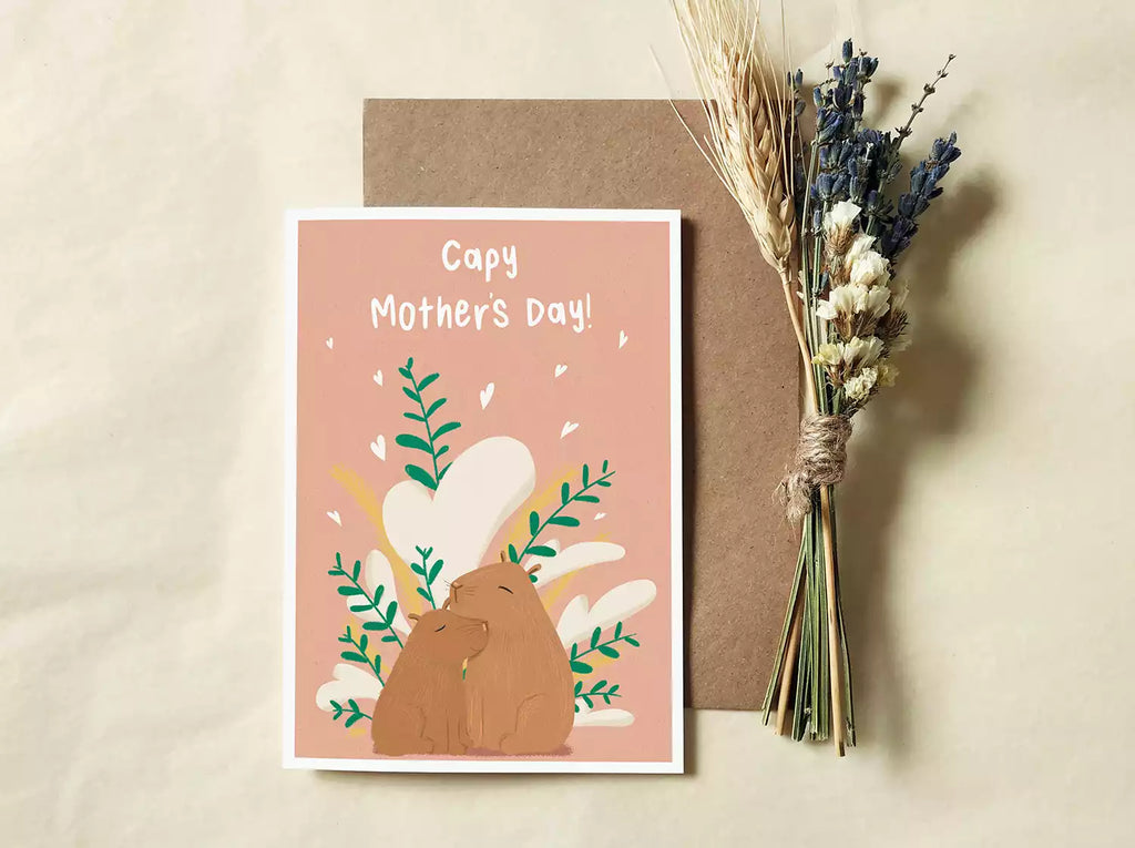 mothers day card with two capybaras and pun 'Capy Mother's Day'
