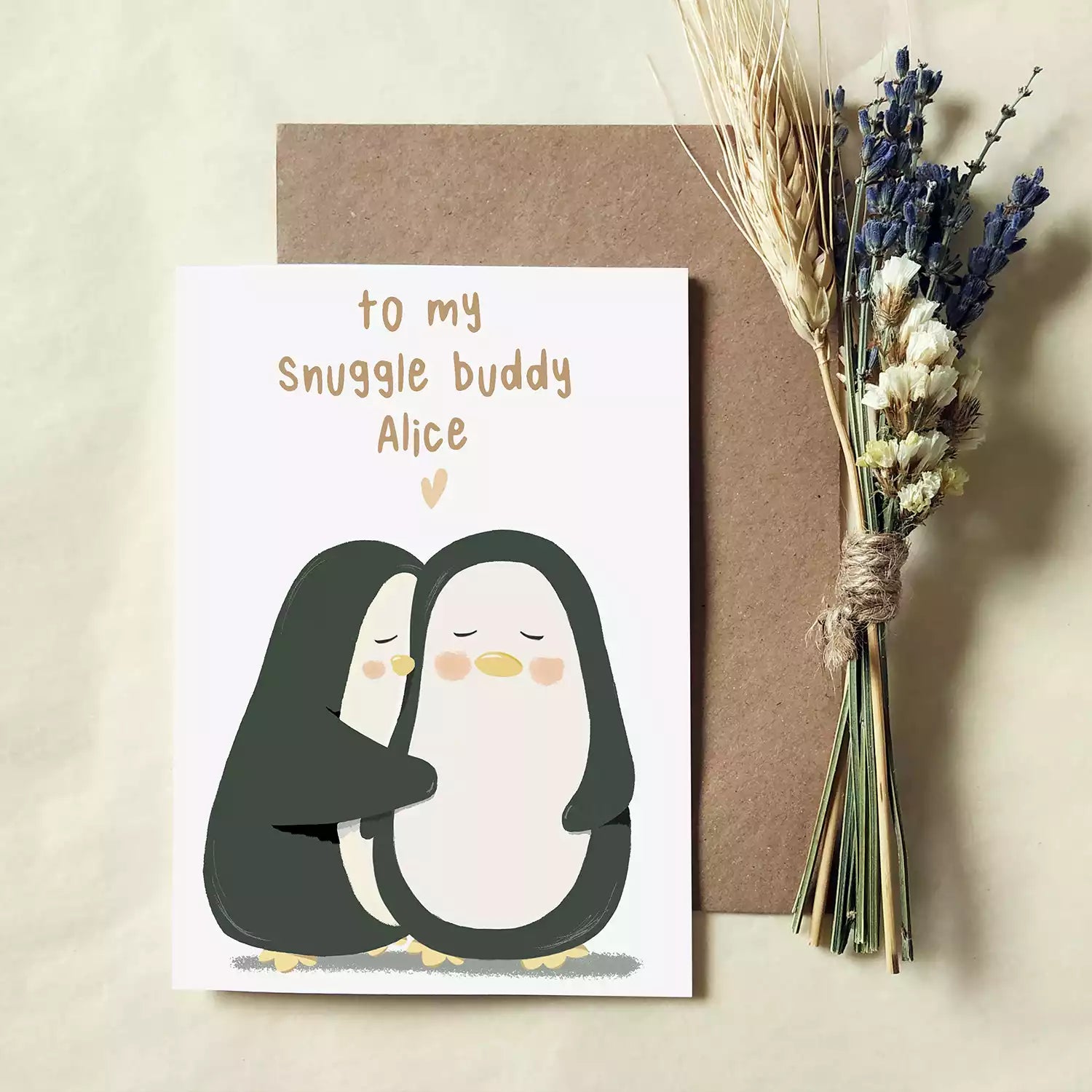 two penguins hugging and personalised text 'to my snuggle buddy'