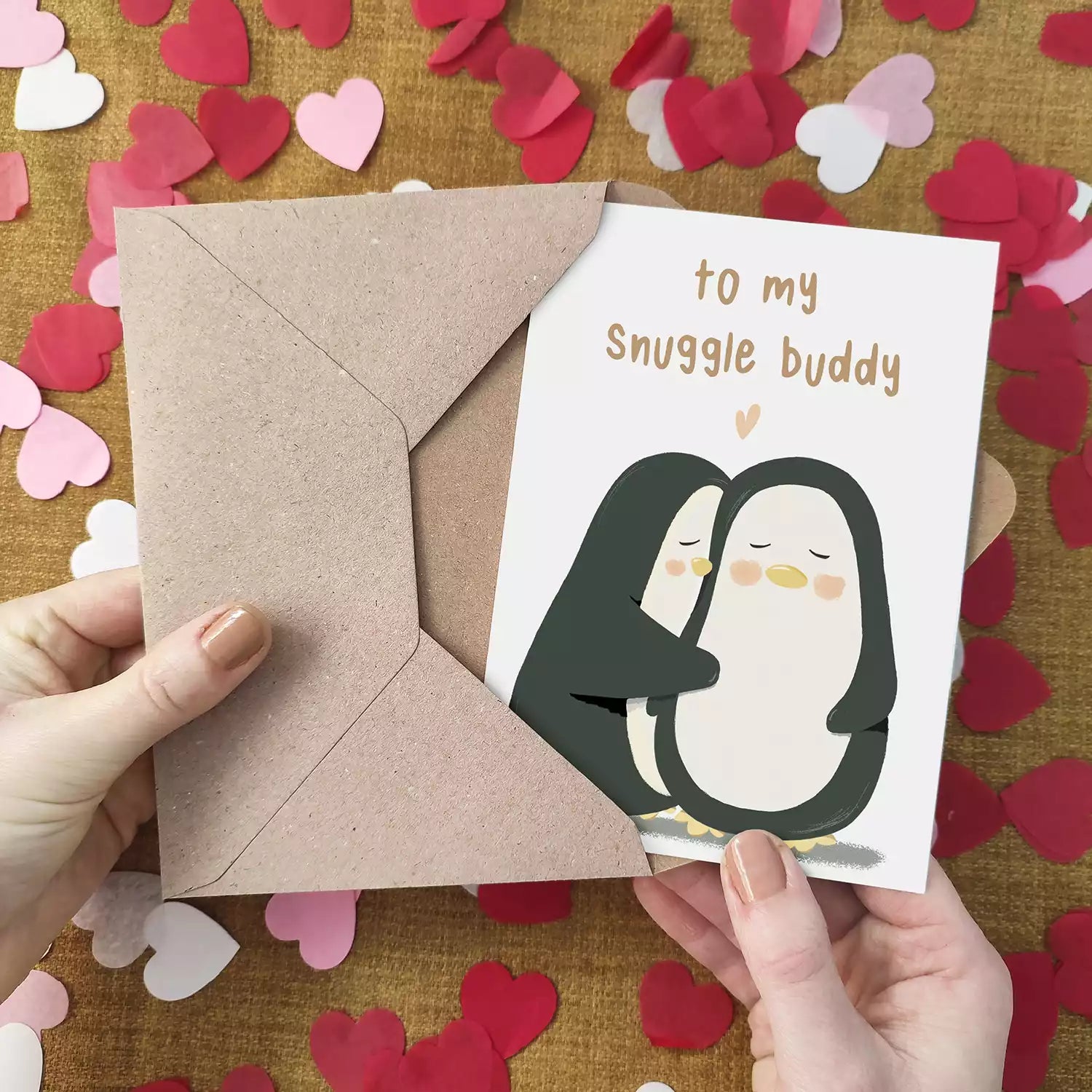 two penguins hugging and personalised text 'to my snuggle buddy'