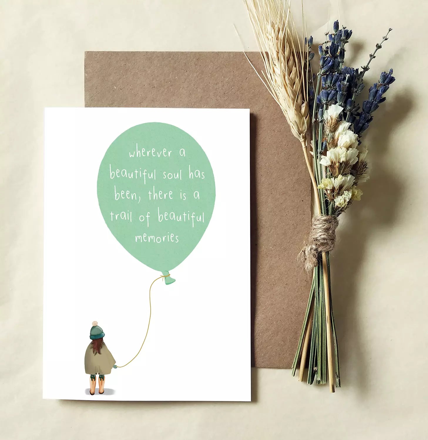 sweet sympathy card with girl and balloon. text: Wherever a beautiful soul has been, there is a trail of beautiful memories.