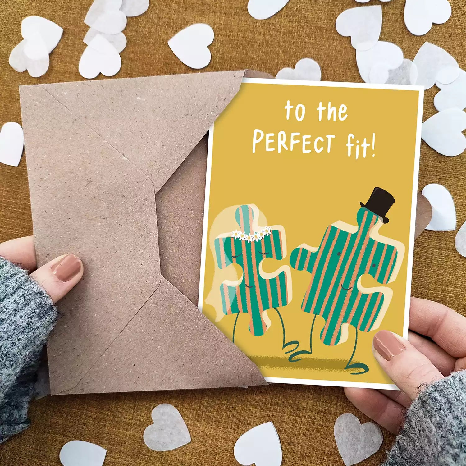 jigsaw pieces wedding card with text 'to the perfect fit' personalised with couple's names